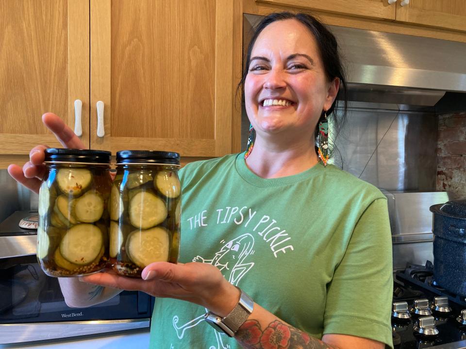 Angela Gerace of The Tipsy Pickle displays jars of her product Oct. 6, 2021 in Burlington.