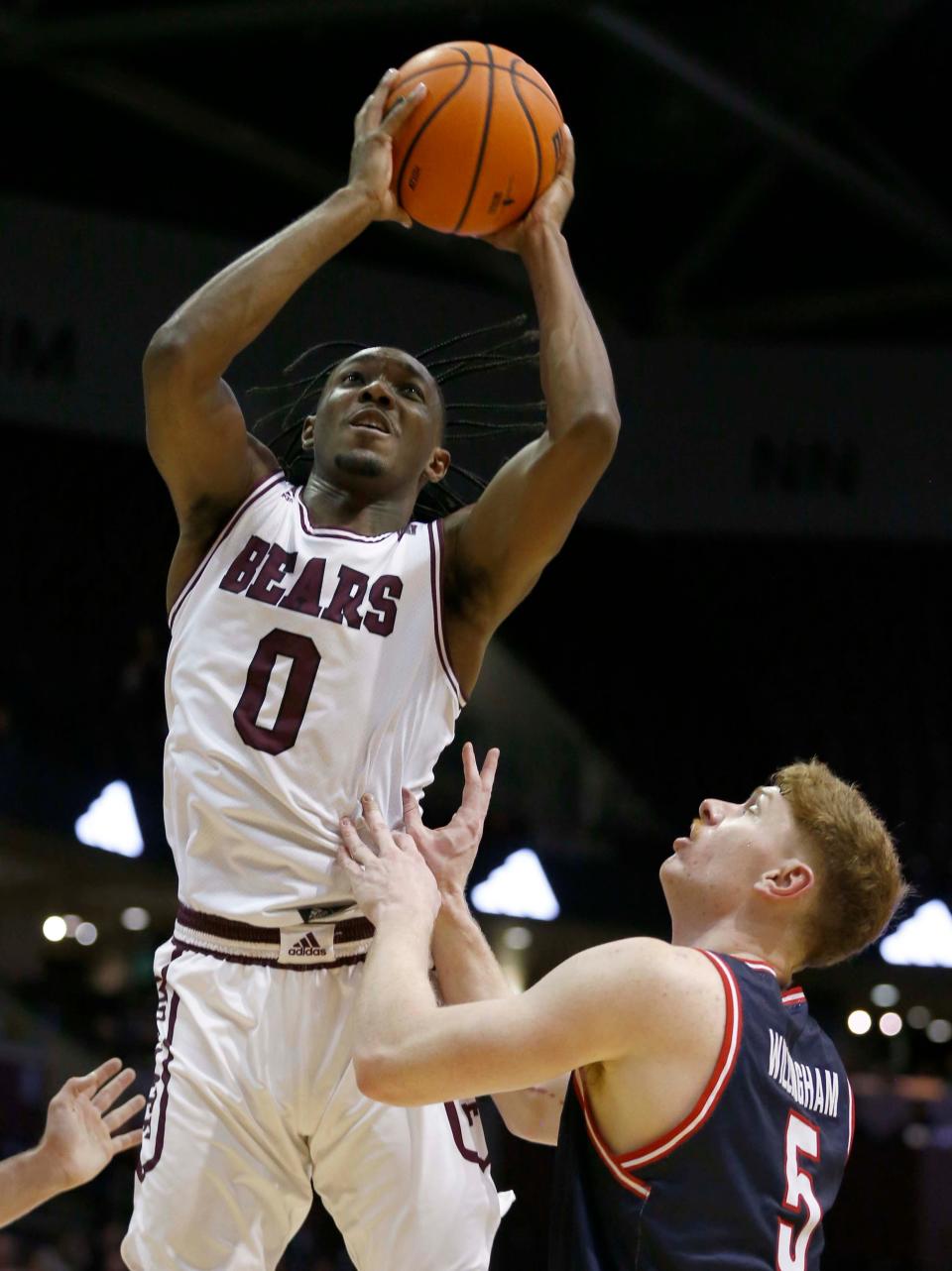 The Missouri State Bears' Chance Moore looks to score against Belmont University at Great Southern Bank Arena on February 3, 2024.