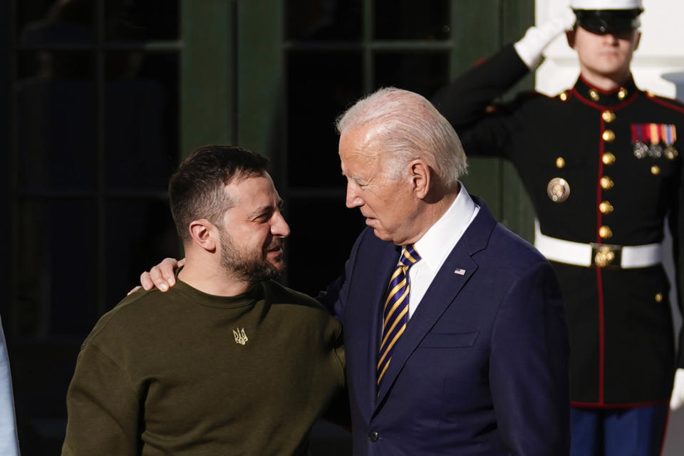 FILE - President Joe Biden welcomes Ukraine's President Volodymyr Zelenskyy at the White House in Washington, Dec. 21, 2022. A section of the National Defense Authorization Act, signed into law by Biden last week, requires U.S. representatives to each global development bank — including the International Monetary Fund— to use “the voice, vote, and influence" of the U.S. as the largest IMF shareholder to put together a voting bloc of countries to change each institution's debt service relief policy to Ukraine. (AP Photo/Andrew Harnik, File)