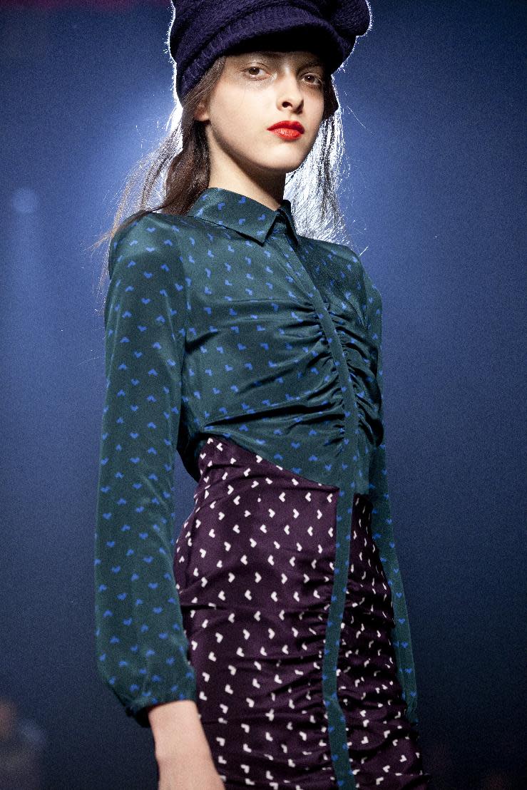 A model walks the runway during the Band of Outsiders Fall 2013 fashion show during Fashion Week, Saturday, Feb. 9, 2013, in New York. (AP Photo/Karly Domb Sadof)