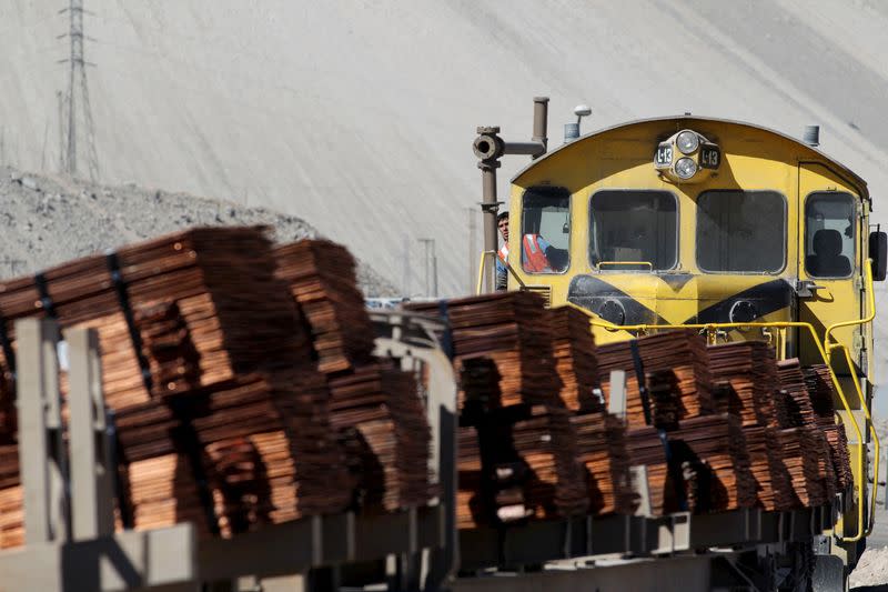 FILE PHOTO: A train loaded with copper cathodes travels along a rail line inside the Chuquicamata copper mine, which is owned by Chile's state-run copper producer Codelco