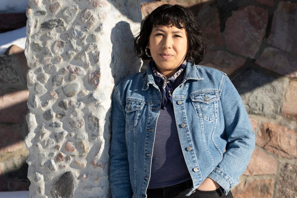 April Matson stands for a portrait in Sioux Falls, S.D., on Wednesday, Feb. 8, 2023. A few months after South Dakota banned abortion in 2022, Matson drove more than nine hours to take a friend to a Colorado clinic to get the procedure. The trip brought back difficult memories of Matson’s own abortion at the same clinic in 2016. The former grocery store worker and parent of two couldn’t afford a hotel and slept in a tent near a horse pasture — bleeding and in pain. (AP Photo/Josh Jurgens)