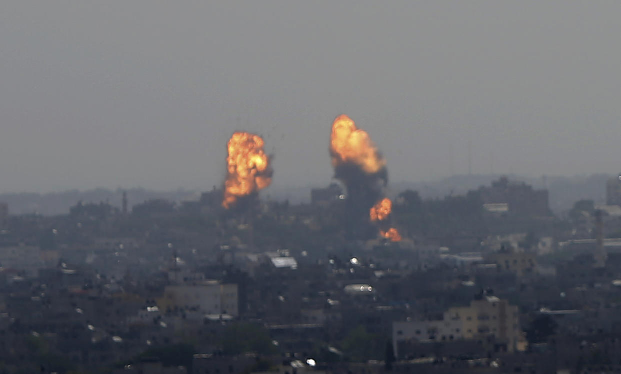 Flares rise after an Israeli forces strike in Gaza City, Tuesday, May 11, 2021. (AP Photo/Hatem Moussa)