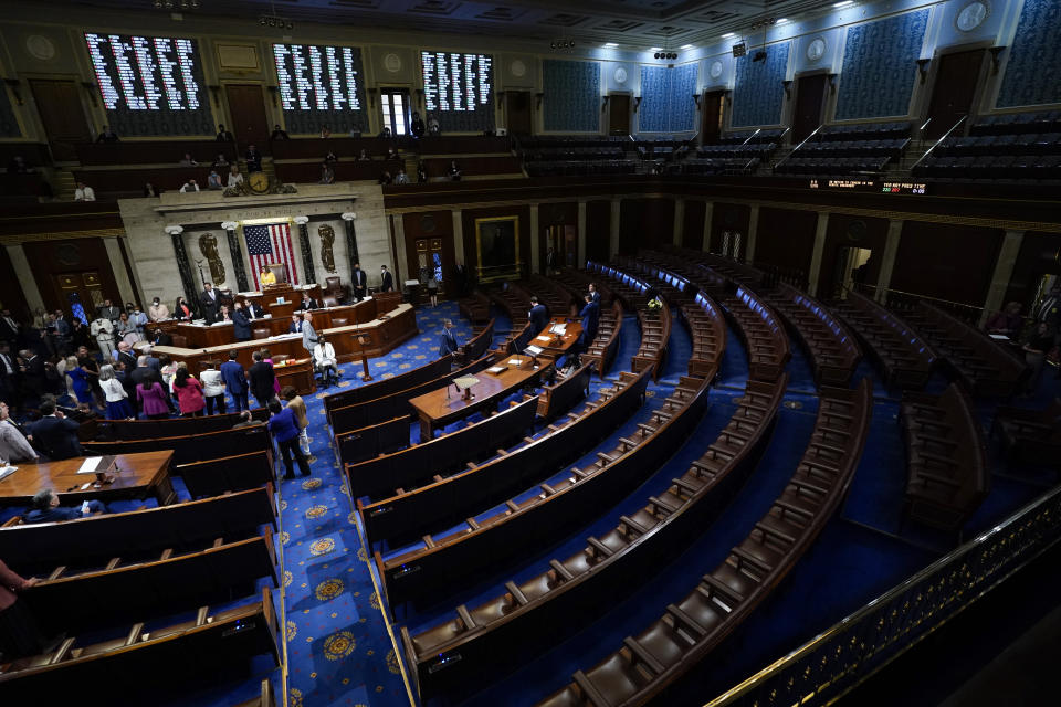 House Speaker Nancy Pelosi of Calif., finishes the vote to approve the Inflation Reduction Act in the House chamber at the Capitol in Washington, Friday, Aug. 12, 2022. A divided Congress gave final approval Friday to Democrats' flagship climate and health care bill. (AP Photo/Patrick Semansky)