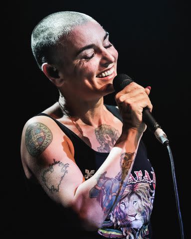 <p>Christie Goodwin/Redferns via Getty</p> Sinéad O'Connor performs at The Roundhouse in August 2014 in London