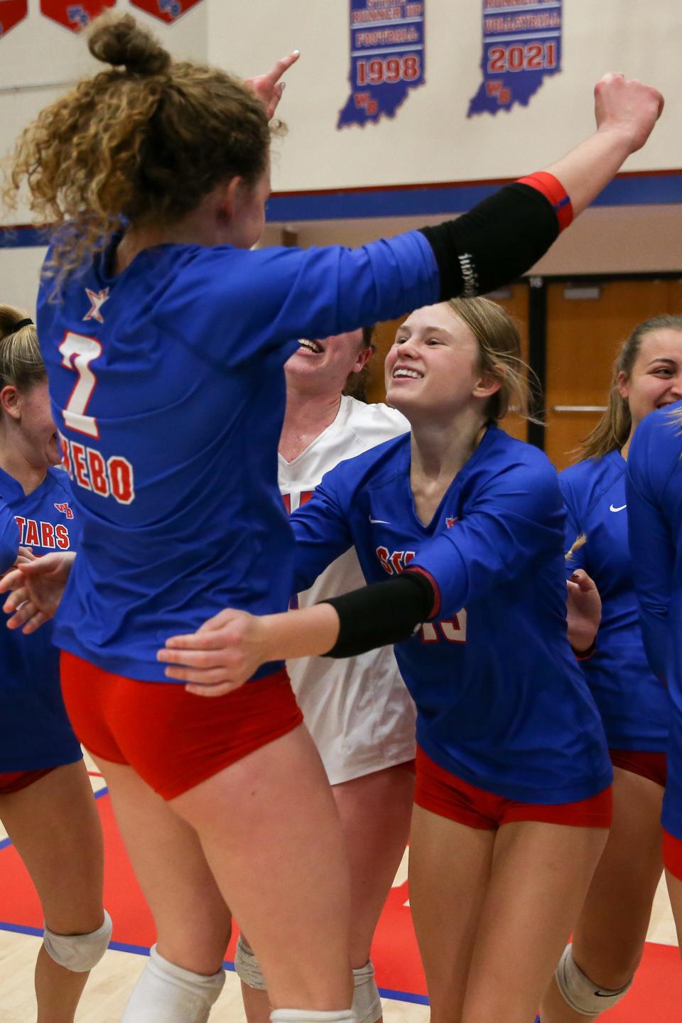 Western Boone Raegan Durbin (2) celebrates their team victory with Western Boone Janie Ransom (15) as Western Boone takes on Tri-West high school during the 2022-23 IHSAA Class 3A Volleyball Sectional 25 Championship, Oct 15, 2022; Thorntown, IN, USA;  at Western Boone High School.