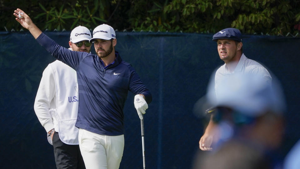 Matthew Wolff, of the United States, motions as he watches Bryson DeChambeau's shot off the fifth tee during the final round of the US Open Golf Championship, Sunday, Sept. 20, 2020, in Mamaroneck, N.Y. (AP Photo/Charles Krupa)