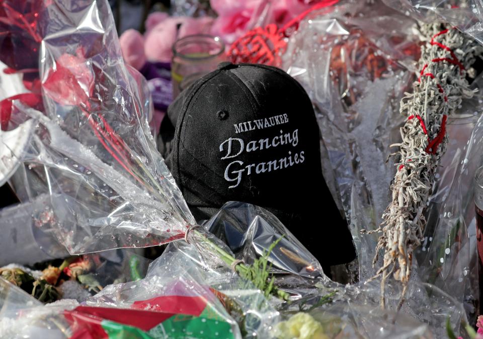 A Dancing Grannies hat is among the items left at Veterans Park in Waukesha as a memorial commemorating those who were killed in the Waukesha Christmas Parade Tragedy that left six people dead and more than 60 injured. Three of the Dancing Grannies members were killed, as was the husband of a fourth member.