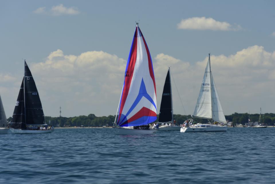 Sailboats drift on the water  during the start of the Bayview Mackinac Race on Lake Huron in Port Huron on Saturday, July 16, 2022.