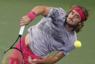 Stefanos Tsitsipas, of Greece, returns a shot to Borna Coric, of Croatia, during the third round of the U.S. Open tennis championships, Friday, Sept. 4, 2020, in New York. (AP Photo/Frank Franklin II)