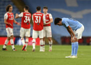 Manchester City's Eric Garcia reacts after the FA Cup semifinal soccer match between Arsenal and Manchester City at Wembley in London, England, Saturday, July 18, 2020. (AP Photo/Justin Tallis,Pool)
