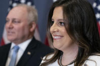 Newly-elected House Republican Conference Chair Rep. Elise Stefanik, R-N.Y., smiles as she speaks with reporters, accompanied by House Minority Whip Steve Scalise of La., on Capitol Hill Friday, May 14, 2021, in Washington. Republicans voted Friday morning for Stefanik to be the new chair for the House Republican Conference, replacing Rep. Liz Cheney, R-Wyo., who was ousted from the GOP leadership for criticizing former President Donald Trump. (AP Photo/Alex Brandon)