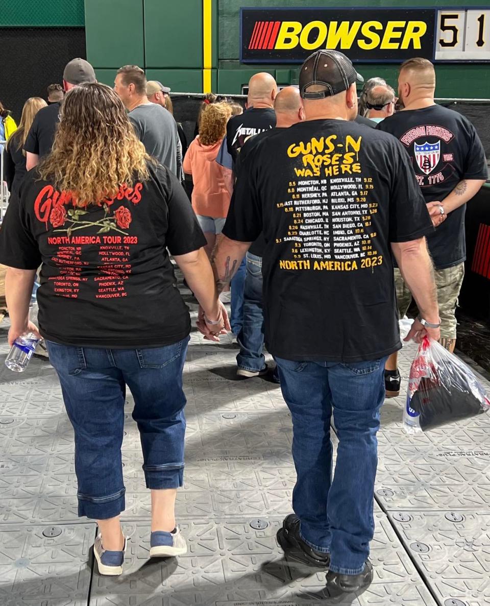 A couple is shown leaving Friday's Guns N' Roses concert at PNC Park in downtown Pittsburgh.