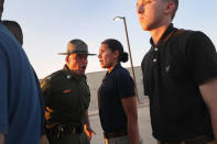 <p>A U.S. Border Patrol instructor yells at a new trainee run upon her initial arrival with fellow agents to the U.S. Border Patrol Academy on August 2, 2017 in Artesia, N.M. (Photo: John Moore/Getty Images) </p>