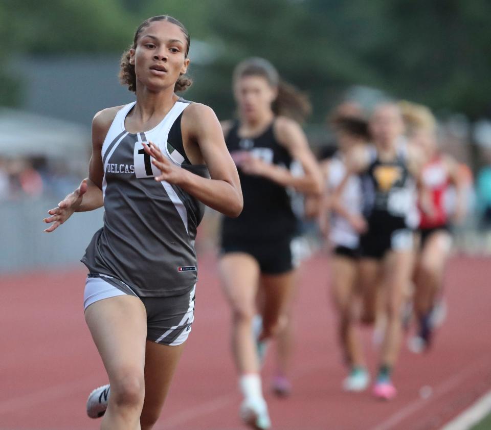 Delcastle's Jalissa Emmens builds a lead before winning the 800 meter run during the Rod Lambert Meet of Champions at Caravel Academy in 2019.
