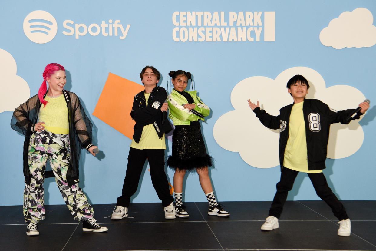 The KIDZ pose for a photo on stage at a recent Central Park concert.