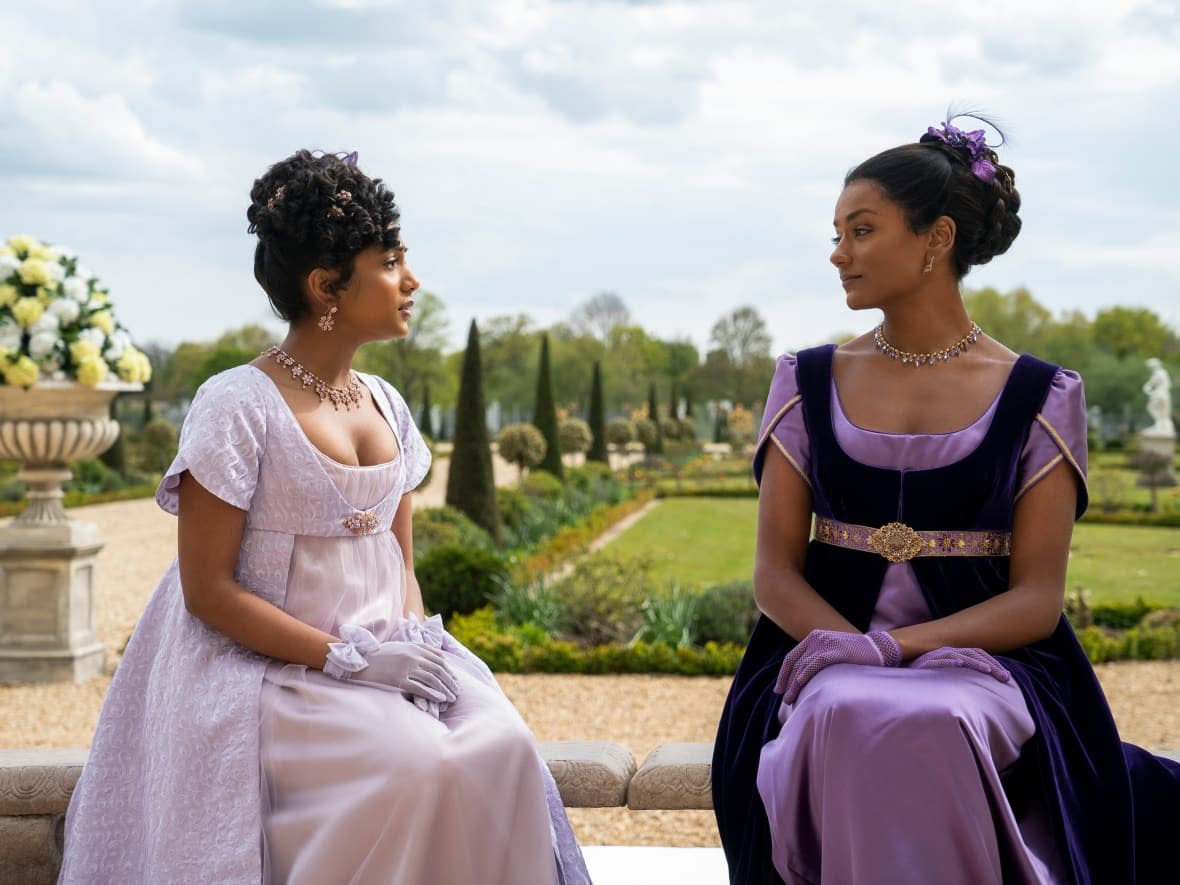 From left, Charithra Chandran as Edwina Sharma and Simone Ashley as Kate Sharma in Bridgerton. The half-sisters re-enter London high society after spending a few years in Bombay. ( Liam Daniel/Netflix - image credit)