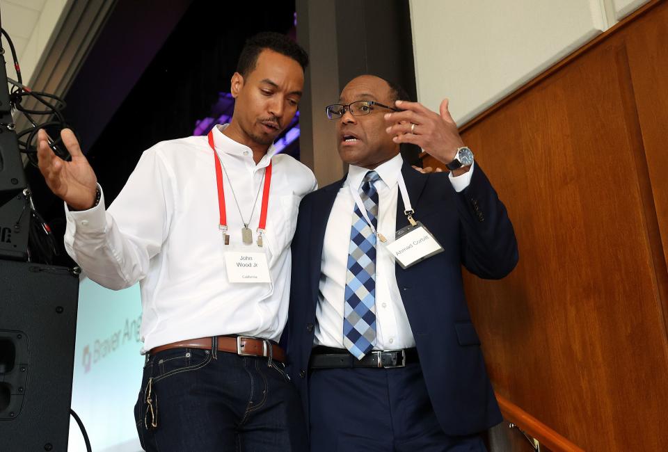 John Wood Jr., a Braver Angels national leader, and Elder Ahmad S. Corbitt, General Authority Seventy of The Church of Jesus Christ of Latter-day Saints, talk at the Braver Angels National Convention at Gettysburg College in Gettysburg, Pa., on Thursday, July 6, 2023. | Kristin Murphy, Deseret News