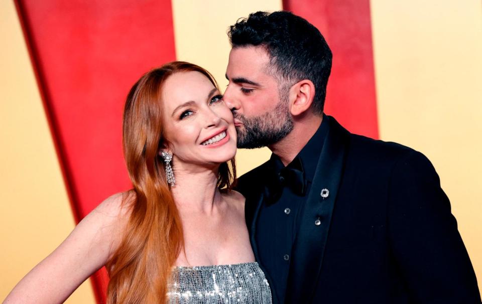 PHOTO: Lindsay Lohan and husband Bader Shammas attend the Vanity Fair Oscars Party in Beverly Hills, Calif., on March 10, 2024.  (Michael Tran/AFP via Getty Images)