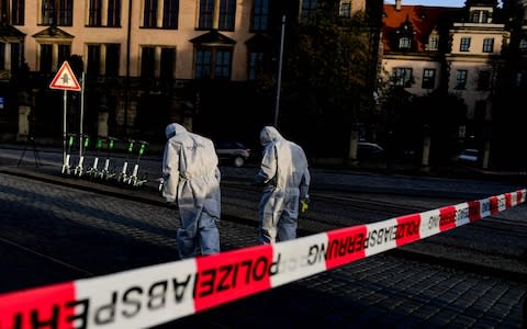 Mandatory Credit: Photo by FILIP SINGER/EPA-EFE/REX (10484532x) Police Forensics officers investigate the area near the Dresden Castle, in Dresden, Saxony, Germany, 25 November 2019. Dresden's Treasury Green Vault was broken into early 25 November. According to the police, the amount of damage is still unclear. Burglary in Dresden's Treasury Green Vault, Germany - 25 Nov 2019 - Credit: FILIP SINGER/EPA-EFE/REX