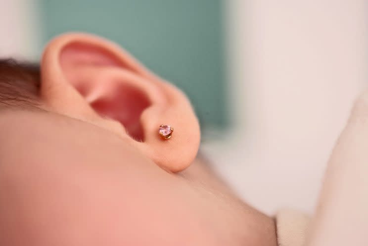 Tattoo parlors across the country are offering ear piercing to young children, including newborns. (Photo: Getty Images)