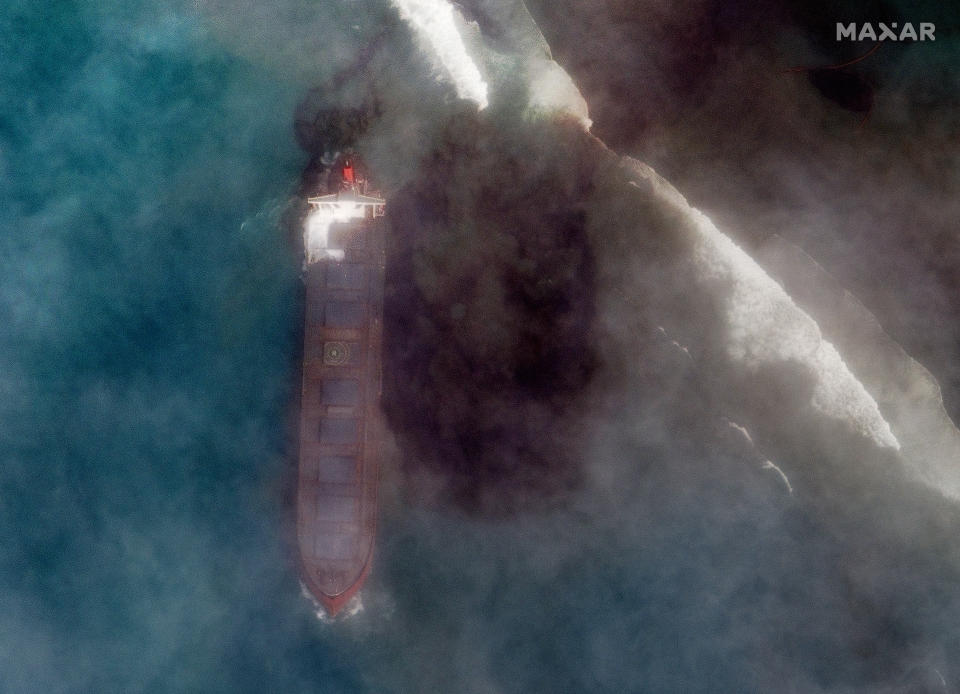 In this satellite image provided by 2020 Maxar Technologies on Friday, Aug. 7, 2020, an aerial view of oil leaking from the MV Wakashio, a bulk carrier ship that recently ran aground off the southeast coast of Mauritius. The prime minister of Mauritius says the government is appealing to France for help with a brewing environmental disaster after a ship that ran aground almost two weeks ago off the Indian Ocean island nation began leaking oil. Prime Minister Pravind Jugnauth said Friday that the leak “represents a danger for Mauritius" and that his country doesn’t have the skills and expertise to refloat stranded ships. ( 2020 Maxar Technologies via AP)