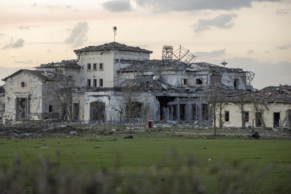 A house damaged by an Iranian ballistic missile attack is seen in Irbil, Iraq, Sunday, March 23, 2022. Iran has claimed responsibility for a missile barrage that struck early Sunday near a sprawling U.S. consulate complex in the northern Iraqi city of Irbil, saying it was retaliation for an Israeli strike in Syria that killed two members of its Revolutionary Guard. (AP Photo/ Ahmed Mzoori, Metrography)