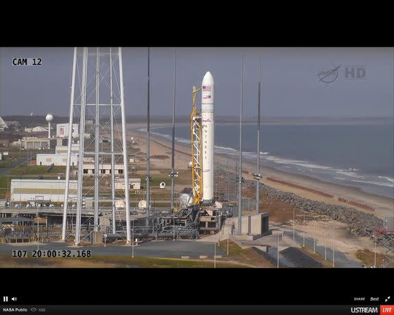 Orbital Sciences' Antares rocket stands on the launch pad about one hour before scheduled launch at 4:00 pm EDT on April 17, 2013, at Wallops Flight Facility, Wallops Island, VA.