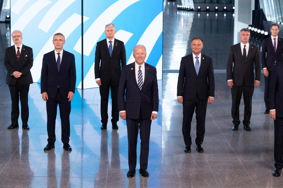 NATO Secretary General Jens Stoltenberg, second left, and U.S President Joe Biden, center, pose with other leaders during a family picture at the NATO headquarters where the 30-nation alliance hopes to reaffirm its unity and discuss increasingly tense relations with China and Russia, as the organization pulls its troops out after 18 years in Afghanistan, Monday June, 14, 2021. (Jacques Witt, Pool via AP)