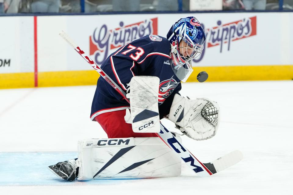 Oct 16, 2023; Columbus, Ohio, USA; Columbus Blue Jackets goaltender Jet Greaves (73) stops a puck during warm ups prior to the NHL hockey game at Nationwide Arena.