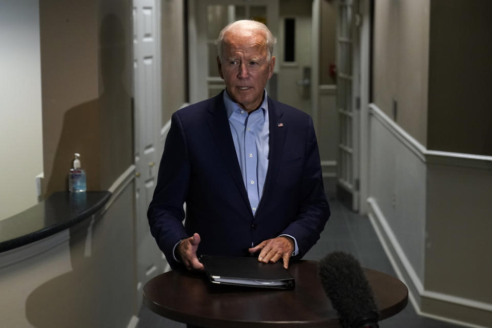 Democratic presidential candidate former Vice President Joe Biden speaks about the death of Supreme Court Justice Ruth Bader Ginsburg after he arrives at at New Castle Airport, in New Castle, Del., Friday, Sept. 18, 2020, as he returns from Duluth, Minn. (AP Photo/Carolyn Kaster)