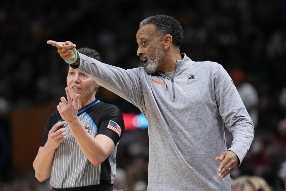 Virginia Tech head coach Kenny Brooks reacts during the first half of an NCAA Women's Final Four semifinals basketball game against LSU Friday, March 31, 2023, in Dallas. (AP Photo/Tony Gutierrez)