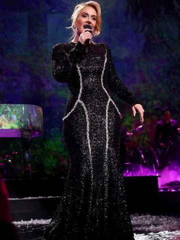 <p>Kevin Mazur/Getty</p> Adele performs in Las Vegas on Jan. 26, 2024