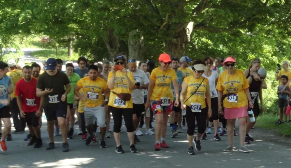 Runners and walkers line up for the Hawley Spring Run 5K in Bingham Park, June 6, 2021.