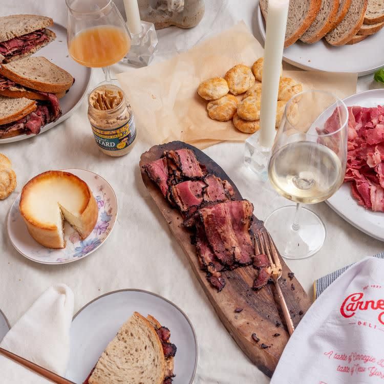 <p>carnegiedeli.com</p><p><strong>$199.00</strong></p><p><a href="https://carnegiedeli.com/collections/products/products/carnegie-deli-dinner-kit" rel="nofollow noopener" target="_blank" data-ylk="slk:Shop Now" class="link rapid-noclick-resp">Shop Now</a></p><p>OK, so this one might not include cheese, but think of the ways you can wow your guests (or the person receiving the gift). Pastrami, corned beef, mustard, rye bread, potato knish bites, and sour pickles can totally be set up as a <a href="https://www.google.com/search?q=charcuterie+board+delish.com&oq=charcuterie+board+delish.com&aqs=chrome..69i57j0i333l3.5832j0j7&sourceid=chrome&ie=UTF-8" rel="nofollow noopener" target="_blank" data-ylk="slk:charcuterie" class="link rapid-noclick-resp">charcuterie</a> board to impress. Plus, you can serve the cheesecake it comes with as dessert.</p>