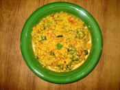 <p>In this delicious recipe, Moong dal (whole green gram) is cooked with select spices. Pressure cook cleaned one cup moong dal with enough water, 1 tsp chopped ginger, turmeric powder & salt to taste. In a kadhai, add 1 tsp oil, some cumin seeds & one bay leaf. When cumin seeds crackle, one one chopped tomato & saute. Add 1-2 slit green chilies, coriander powder & garam masala to taste. Add cooked dal. Cook till very less water remains & serve garnished with coriander leaves. “Creative Commons Moong Ki Kharri Dal” Miansari66 is licensed under CC BY 1.0 </p>