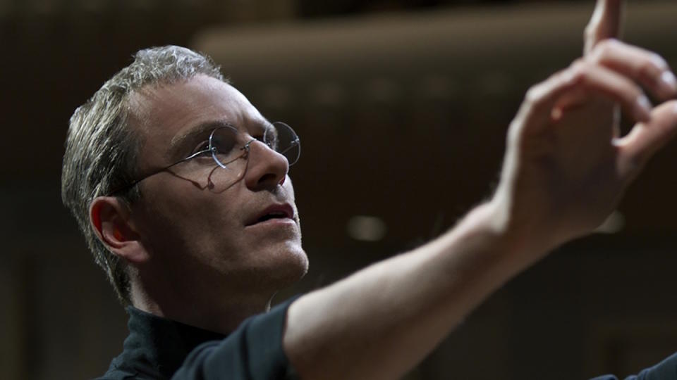 Michael Fassbender on stage rehearsing a presentation in Steve Jobs