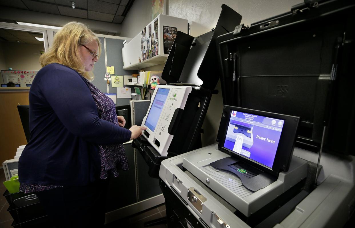 El Paso County Elections Admistrator Lisa Wise demonstrates the new voting machines at her Downtown El Paso office in 2020.