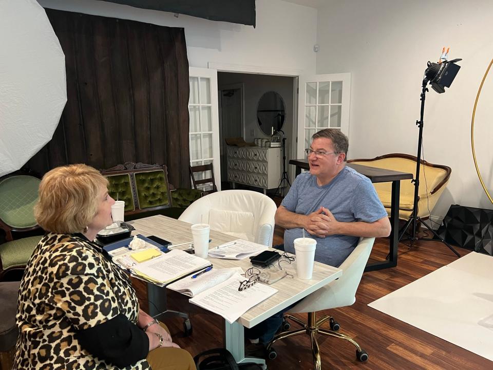 Authors Becky Hill, at left, and Neil Gordon hard at work at a studio in Augusta, GA.