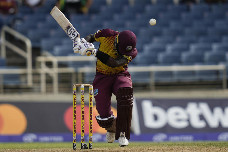 West Indies' Shamarh Brooks avoids a delivery during the third T20 cricket match against New Zealand at Sabina Park in Kingston, Jamaica, Sunday, Aug. 14, 2022. (AP Photo/Ramon Espinosa)