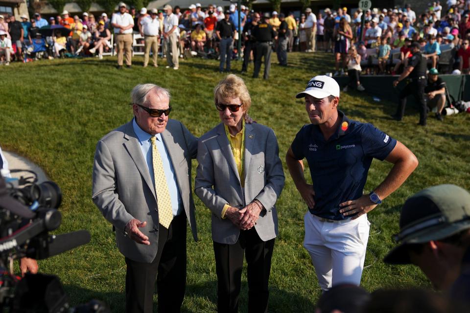 Should Viktor Hovland, right and standing with Barbara and Jack Nicklaus, win the Memorial Tournament again in 2024, his payout will be even higher.
