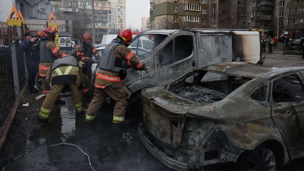 PHOTO: A view of emergency workers at the site of a Russian missile strike, amid Russia's attack on Ukraine, in Kyiv, Ukraine, March 9, 2023. (Gleb Garanich/Reuters)