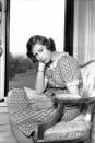 <p>Princess Elizabeth took a quick break from reading for a quick photograph on a porch at Windsor Castle.</p>