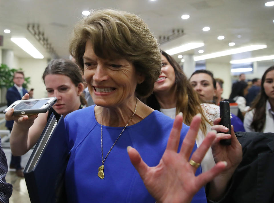 Sen. Lisa Murkowski (R-Alaska) flees reporters in July who were asking&nbsp;how she planned to vote on Obamacare repeal legislation. She stuck it to the president and her party leaders by helping to kill it. (Photo: Mark Wilson via Getty Images)