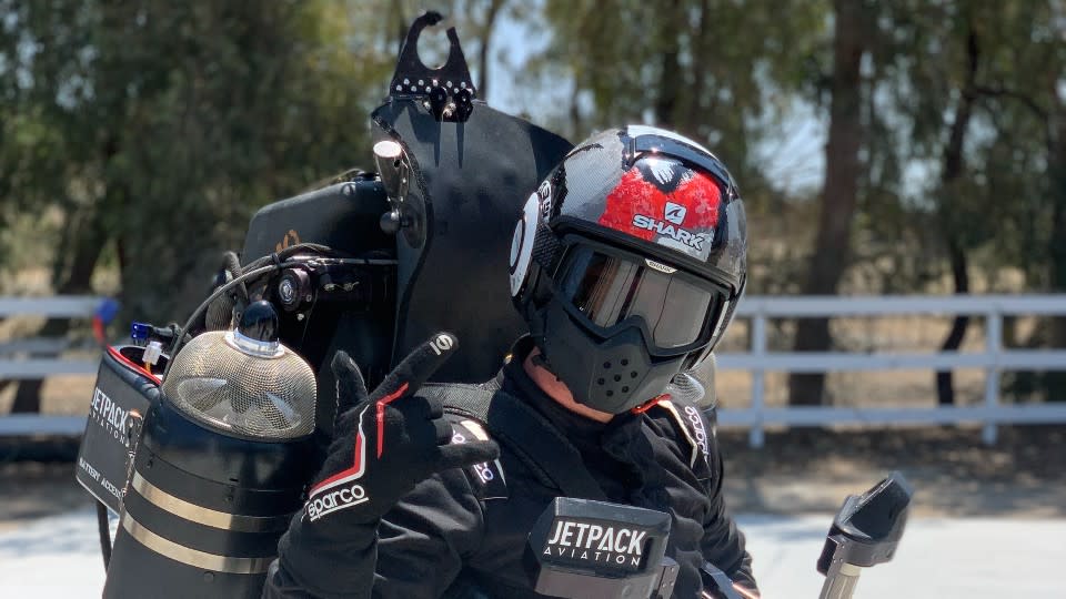 The pilot wears a protective suit and helmet, with a mini-rocket engine on his back. Flying is physically rigorous and most flights last from six to ten minutes. - Credit: Courtesy Jetpack Industries