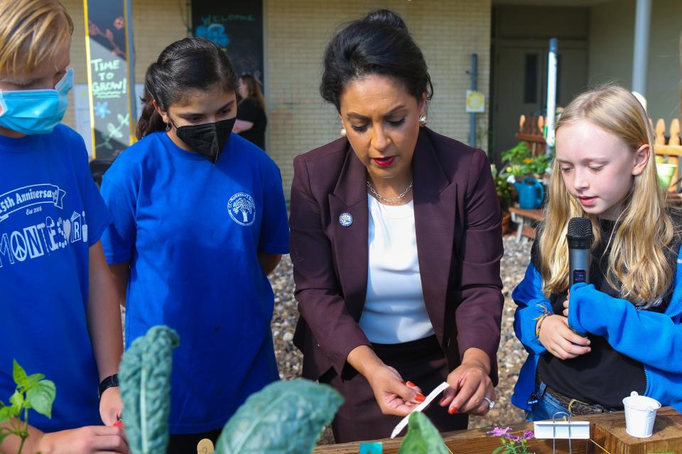 Corpus Christi Mayor Paulette Guajardo learns about square foot gardening from students at the Corpus Christi Montessori School Friday, Nov. 12, 2021.