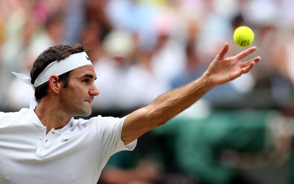 Federer in service action