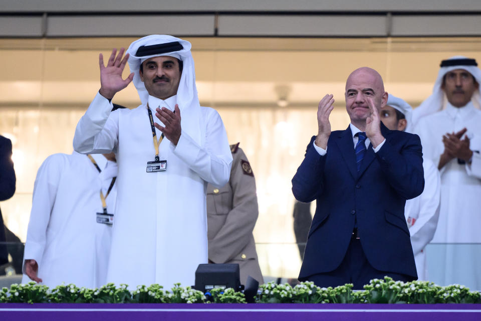 Qatar's emir Sheikh Tamim Hamad Al-Thani (left) together with Fifa president Gianni Infantino prior to the 2022 World Cup Group A match between Qatar and Ecuador. 