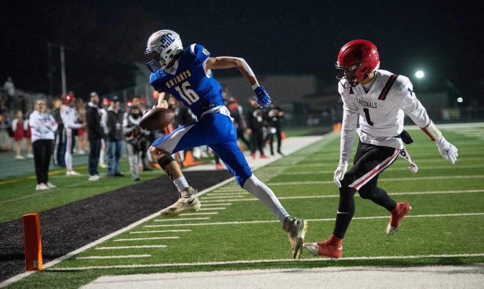 Ripon Christian’s Jace Beidleman makes a catch on a two-point conversion as Woodland Christian’s Billy Hinkle defends during the Sac-Joaquin Section Division VII championship game at St. Mary’s High School in Stockton, Calif., Friday, Nov. 25, 2022.