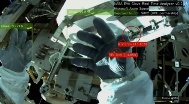 An image of a spacewalker’s gloves is analyzed for signs of wear using AI. (Microsoft Photo)